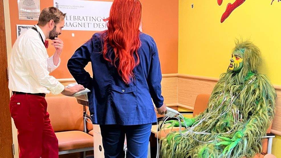 The holidays got a little greener, and a lot more mischievous, at the University of Maryland Golisano Children’s Hospital as the Grinch visited patients and staff. (University of Maryland Golisano Children’s Hospital)
