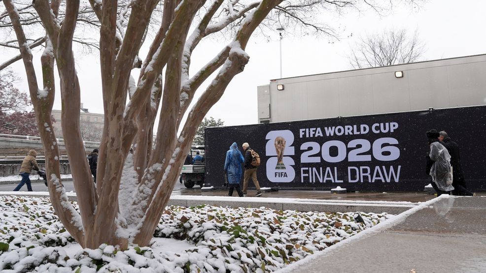 People arrive for the draw for the 2026 soccer World Cup at the Kennedy Center in Washington, Friday, Dec. 5, 2025. (AP Photo/Stephanie Scarbrough)