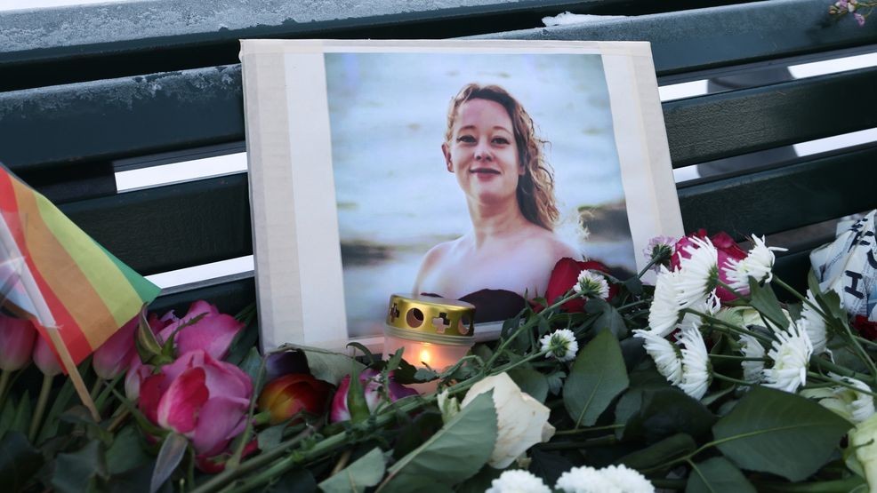 A portrait of Rene Nicole Good stands in front of the U.S. Embassy among flowers and candles left by mourners following a vigil on Jan. 11, 2026 in Berlin, Germany. (Photo by Sean Gallup/Getty Images)
