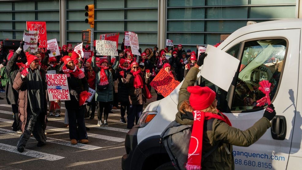 Nurses strike outside New York-Presbyterian Hospital, Monday, Jan. 12, 2026, in New York. (AP Photo/Yuki Iwamura)