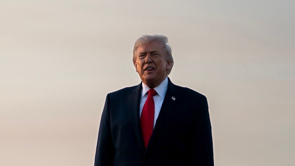 WEST PALM BEACH, FLORIDA - FEBRUARY 13: U.S. President Donald Trump shouts toward members of the media after exiting Air Force One at Palm Beach International Airport on February 13, 2026 in West Palm Beach, Florida. The President is spending the weekend at Mar-a-Lago in Palm Beach, Florida. (Photo by Nathan Howard/Getty Images)