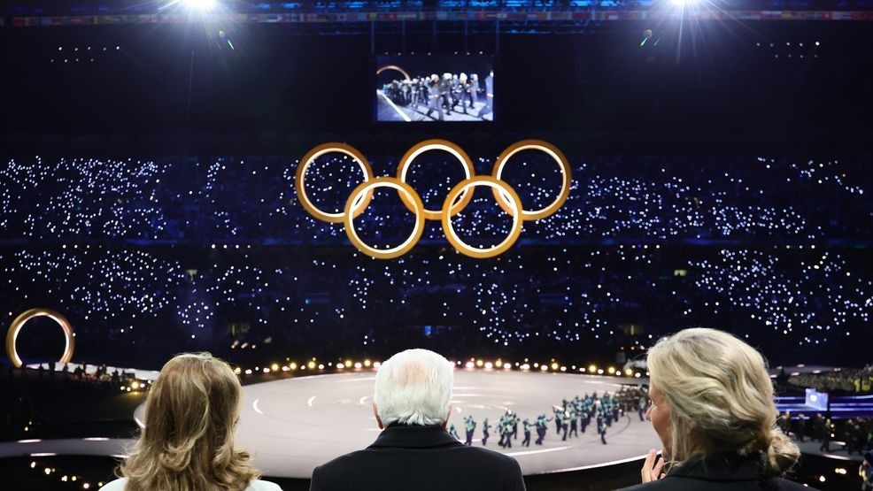Sergio Mattarella President of Italy, center, his wife Laura Mattarella, left, and Kirsty Coventry President of the IOC attend the Olympic opening ceremony at the 2026 Winter Olympics, in Milan, Italy, Friday, Feb. 6, 2026. (Andreas Rentz/Pool Photo via AP)