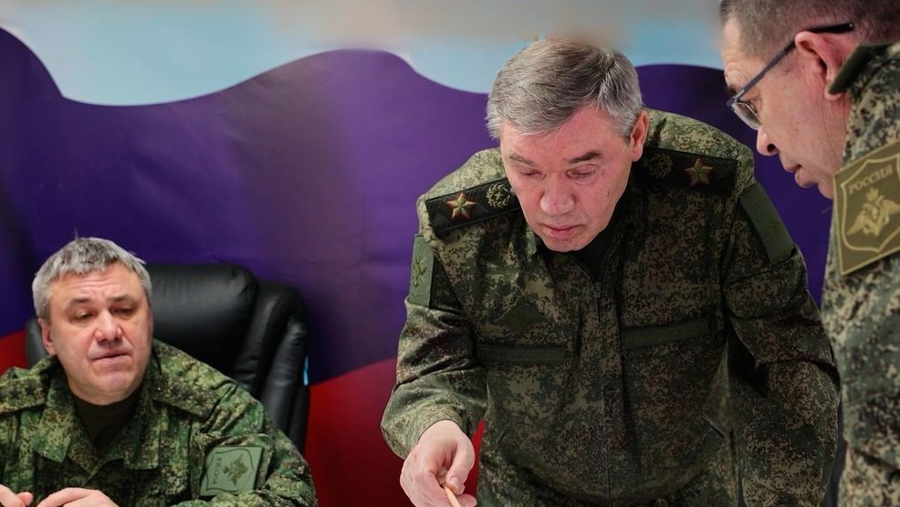 In this image made from video provided by Russian Defense Ministry Press Service on Saturday, Feb. 14, 2026, Russian Chief of General Staff Gen. Valery Gerasimov, second right, speaks while inspecting the troops involved in the fighting in Ukraine. (Russian Defense Ministry Press Service via AP)