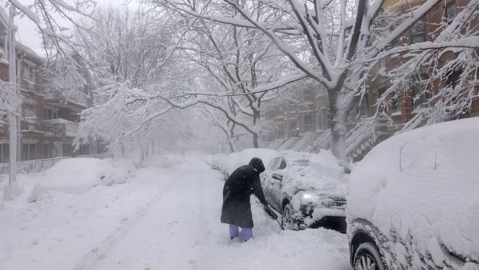 NEW YORK CITY - FEBRUARY 23: People shovel snow in the streets of Brooklyn as blizzard conditions continue on February 23, 2026 in New York City. New York City Mayor Zohran Mamdani announced a state of emergency yesterday for New York City and issued a travel ban until 12 p.m. on Monday. New York City is expecting well over a foot of snow in what has become one of the largest winter storms in the city's history. (Photo by Spencer Platt/Getty Images)