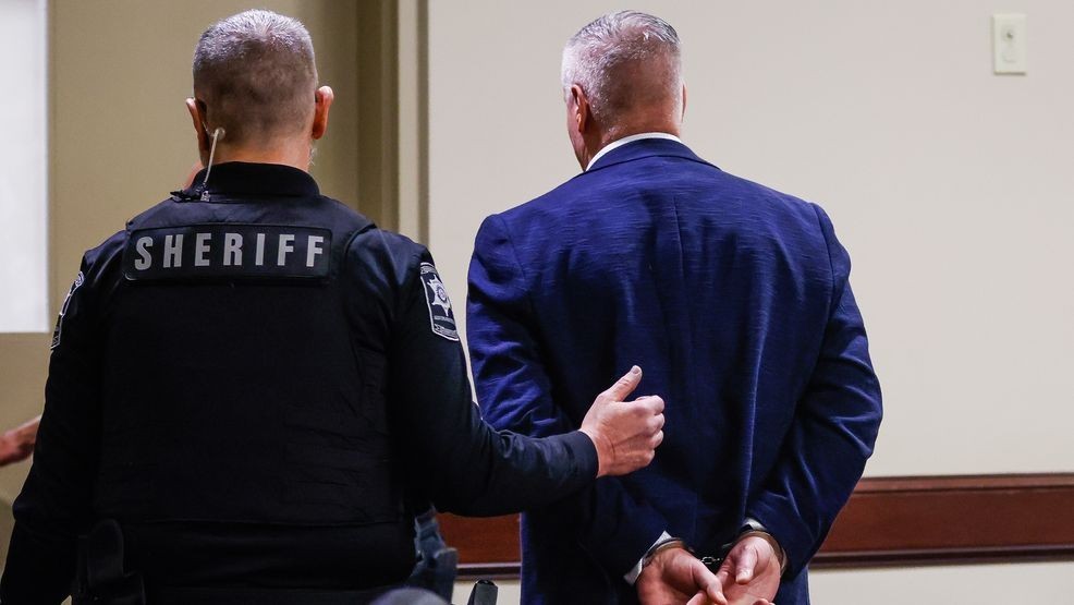 Colin Gray, the father of Apalachee High School shooting suspect Colt Gray, is handcuffed and escorted out of the room after jury deliberations at his trial at Barrow County Courthouse in Winder, Ga., Tuesday, March 3, 2026. (Abbey Cutrer/Atlanta Journal-Constitution via AP, Pool)