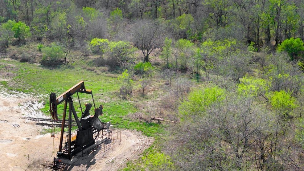 GILLETT, TEXAS - MARCH 11: In an aerial view, a pump jack operates in a field on March 11, 2026 in Gillett, Texas. The recent war involving Iran, the United States, and Israeli forces continues raising global concern over energy prices as attacks on energy infrastructure disrupt oil production and halt exports across the region. (Photo by Brandon Bell/Getty Images)