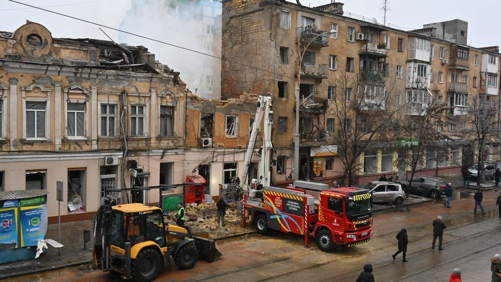 Rescue workers clear the rubble of a residential building which was heavily damaged after a Russian strike in Odesa, Ukraine, Tuesday, Jan. 27, 2026. (AP Photo/Michael Shtekel)