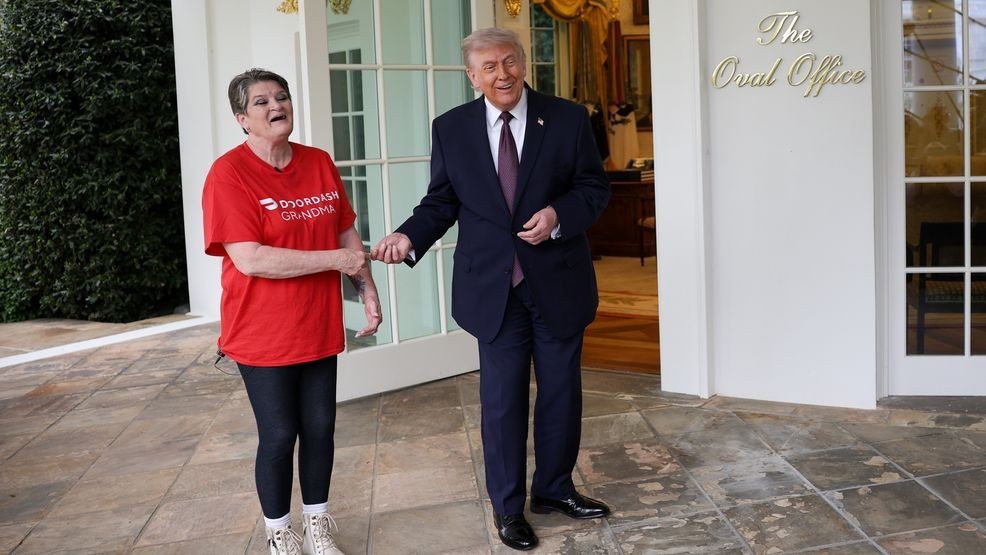 WASHINGTON, DC - APRIL 13: U.S. President Donald Trump tips Sharon Simmons after receiving a DoorDash delivery of McDonald's during an event outside the Oval Office of the White House on April 13, 2026 in Washington, DC. The president spoke about the No Tax on Tips, Pope{ }Leo XIV and the ongoing negotiations with Iran.  (Photo by Win McNamee/Getty Images)