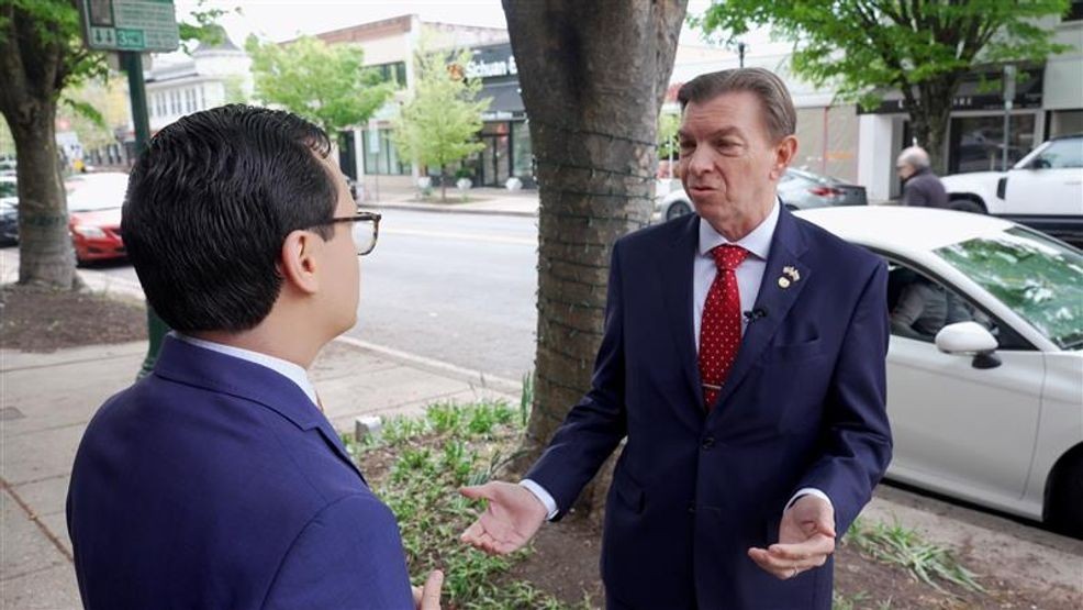 John Myrick, right, a Republican candidate challenging Maryland Gov. Wes Moore in November, speaks with Spotlight on Maryland's investigative journalist Gary Collins, left, in Towson, Md. on April 22, 2026.  (Steve Pierce/Spotlight on Maryland){p}{/p}