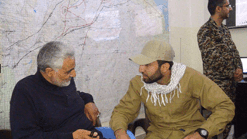 The Department of Justice says this photo shows Mohammad Baqer Saad Dawood al-Saadi with former  Iranian military commander Qasem Soleimani. (Photo: Department of Justice)