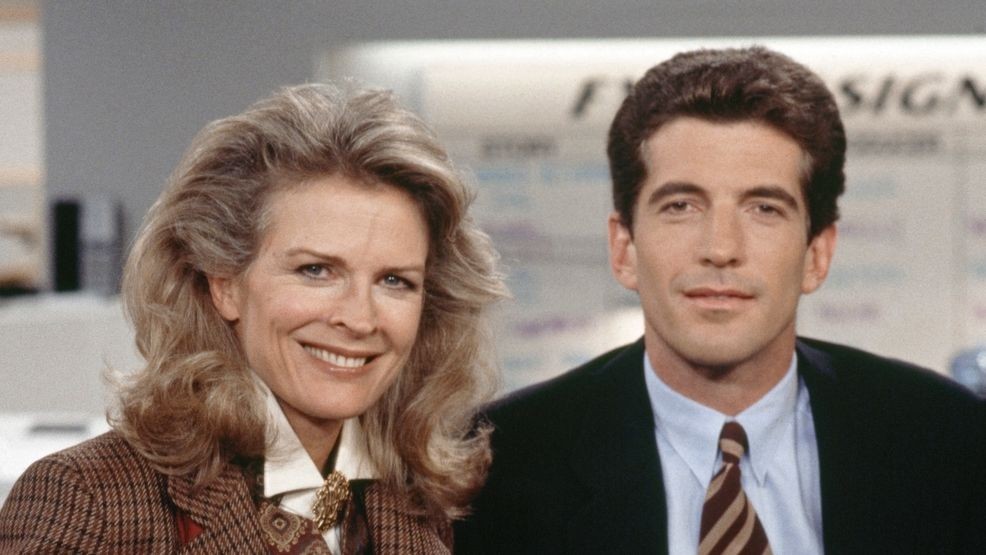 LOS ANGELES - JANUARY 1: (Pictured left to right) Candice Bergen stars as Murphy Brown, a seasoned broadcast journalist, and John F. Kennedy Jr. guest stars as himself on "Murphy Brown," a CBS television situation comedy program featuring topical current events and satire. Episode titled: "Altered States". Image dated: January 1, 1995. Los Angeles, CA. (Photo by CBS via Getty Images)