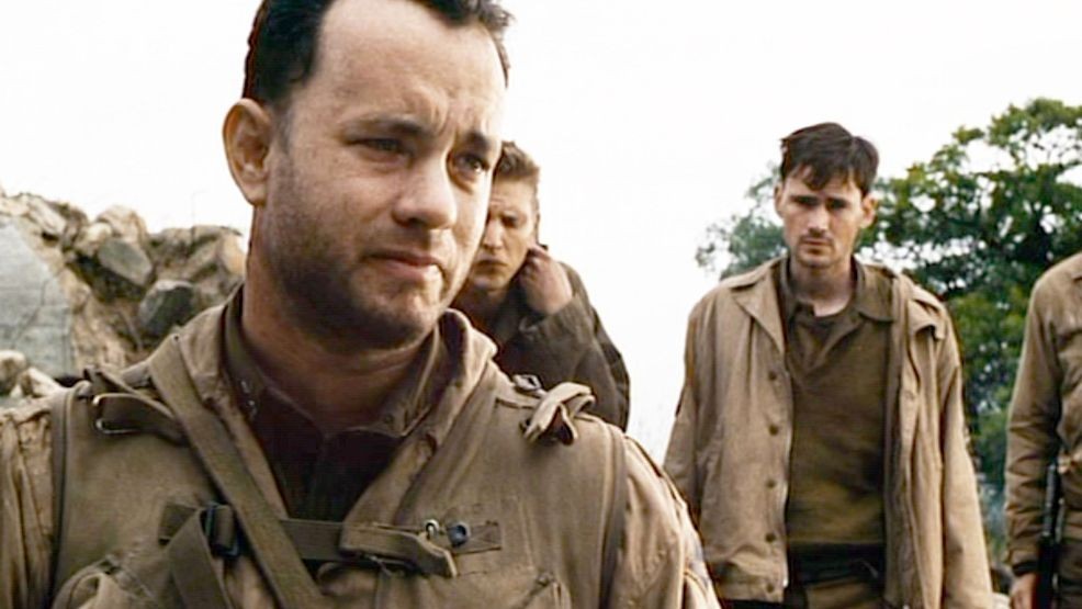 LOS ANGELES - JULY 24: The movie "Saving Private Ryan", directed by Steven Spielberg. Seen here in foreground, Tom Hanks (as Captain John H. Miller).  Theatrical release July 24, 1998. Screen capture. A Paramount Picture. (Photo by CBS via Getty Images)