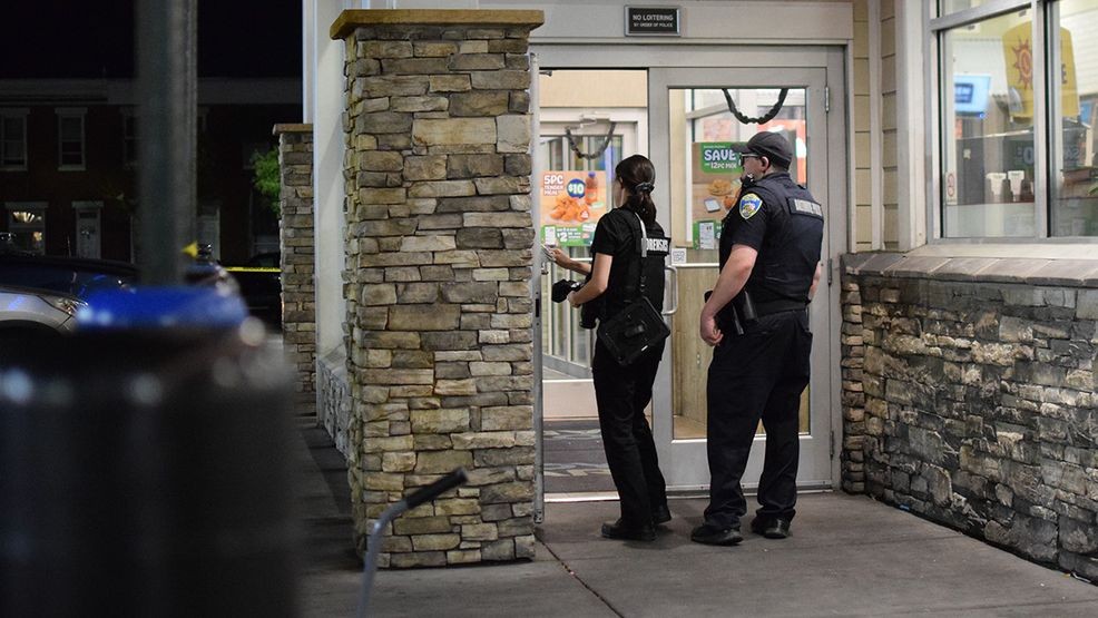 Baltimore police investigate a report of a person injured by gunfire in the 3300 block of East Fayette Street on Friday morning. (WBFF / Maggie Ybarra)
