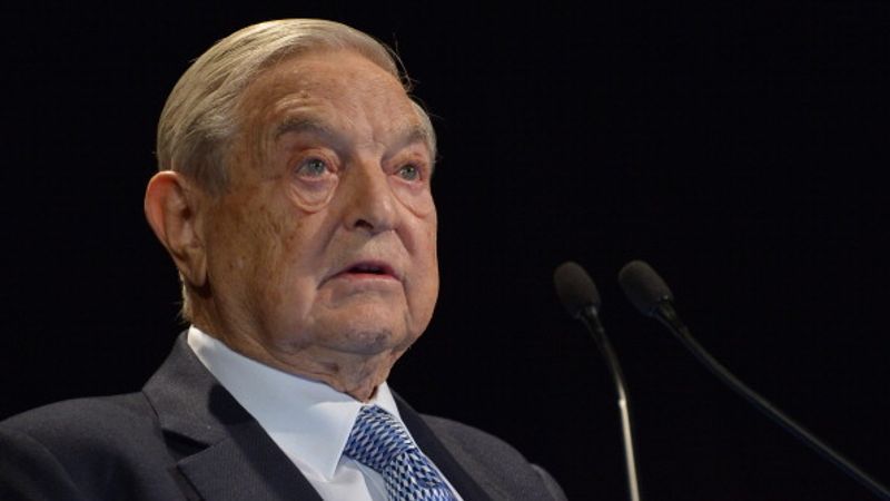 NEW YORK, NY - NOVEMBER 06:  Honoree George Soros speaks onstage at the Annual Freedom Award Benefit hosted by the International Rescue Committee at the Waldorf-Astoria hotel on November 6, 2013 in New York City.  (Photo by Mike Coppola/Getty Images for International Rescue Committee)