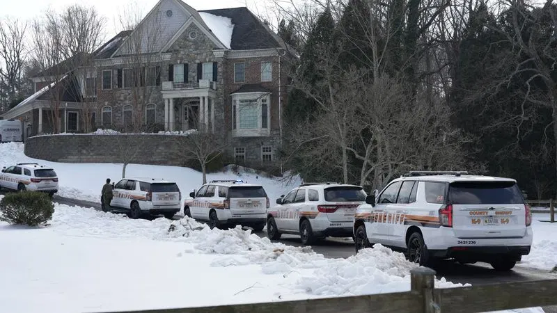 Shortly after 10:30 a.m. on Wednesday, February 11, 2026, nearly a dozen Montgomery County Sheriff's Department deputies converged on a $2.3 million Bethesda, Md., home taken over by squatters. Deputies were joined by more than two dozen laborers and property security experts. (Steve Pierce/Spotlight on Maryland)