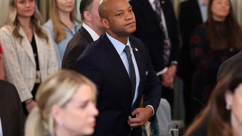 WASHINGTON, DC - FEBRUARY 20: Maryland Gov. Wes Moore stands as U.S. President Donald Trump enters the room during a working breakfast with administration officials and governors in the State Dining Room at the White House on February 20, 2026 in Washington, DC. Trump met with a group of governors, who are in town for the National Governors Association winter meeting, after he initially invited only Republican members of the group, causing a backlash from the bipartisan organization. (Photo by Kevin Dietsch/Getty Images)