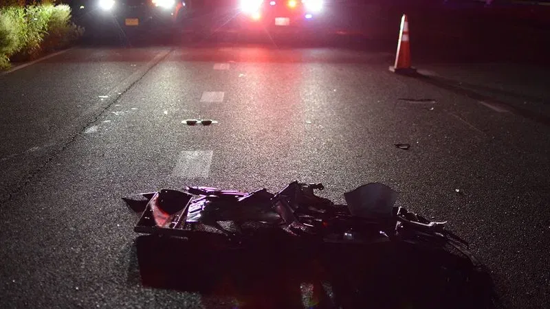 The remnants of crushed vehicles were scattered across I-695 following a report of a collision involving a Maryland State Police trooper on Thursday. (WBFF / Maggie Ybarra)