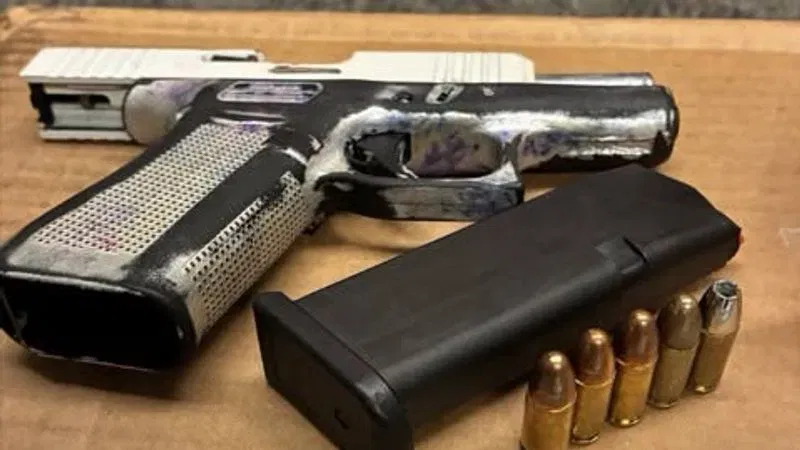 A Glock 43X handgun with an obliterated serial number containing five 9mm rounds of ammunition that was seized during a traffic stop in Carroll County. (Carroll County Sheriff's Office)